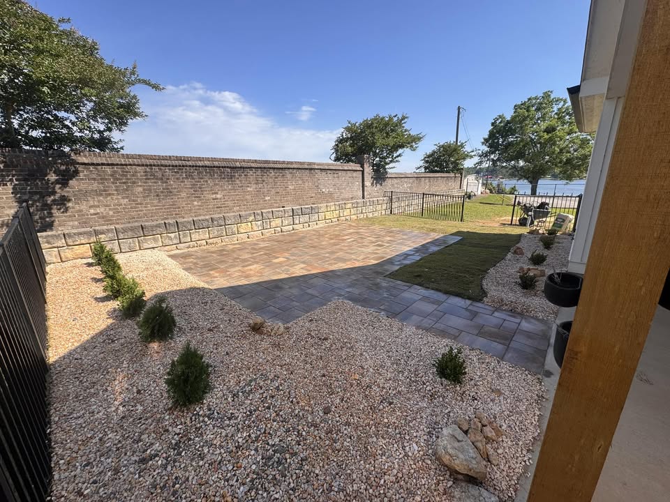 Paver patio and landscaped beds finished by Lindley's Lawn and Landscape